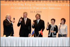 Australias Minister for Agriculture Tony Burke (centre left) and Financial Secretary John Tsang (ce