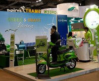 Photo: Hong Kong exhibitor demonstrates application of its new e-scooter