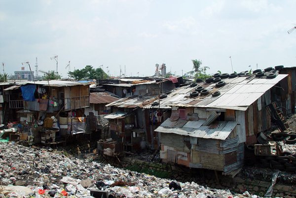 Photo: Jakarta slums: Set to be cleared in a massive China-backed development programme.
