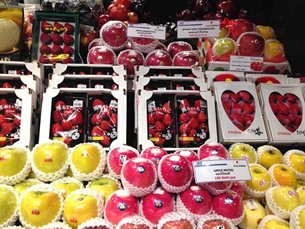 Photo: Imported fruit sold in a supermarket.