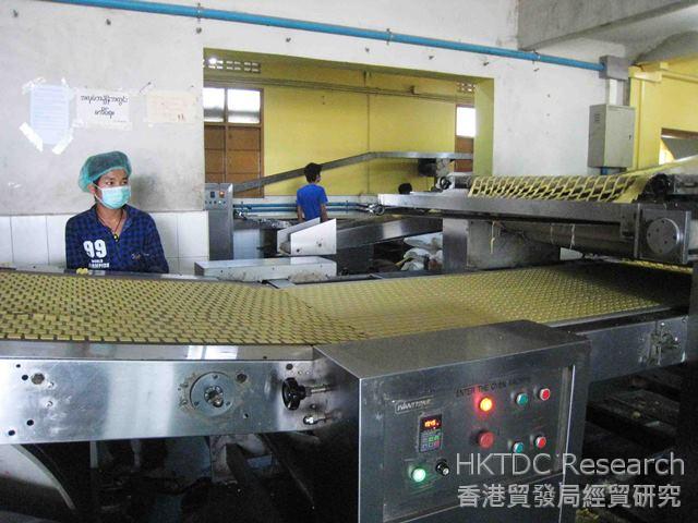 Photo: A biscuits factory in the Mandalay Industrial Zone with raw materials imported from China