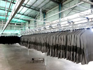 Photo: Suit jackets ready for export to Europe. Photo: Suit jackets ready for export to Europe.