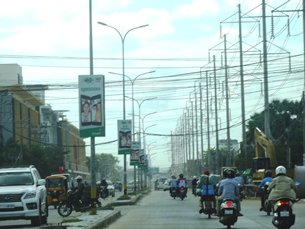 Photo: Paved road within Phnom Penh’s city centre.