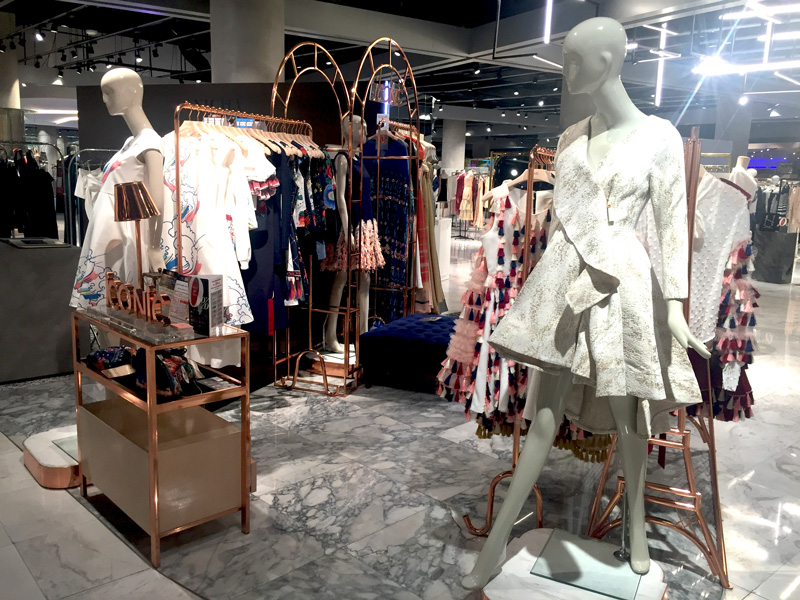 Photo: Designer clothing in an upscale shopping mall – EmQuartier. Photo: Designer clothing in an upscale shopping mall – EmQuartier.