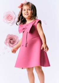 Tacheri outfits feature oversized bows Tacheri outfits feature oversized bows